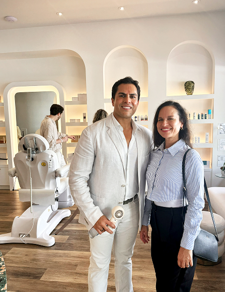 Man and woman smiling in modern wellness clinic, highlighting personalized growth hormone therapy benefits