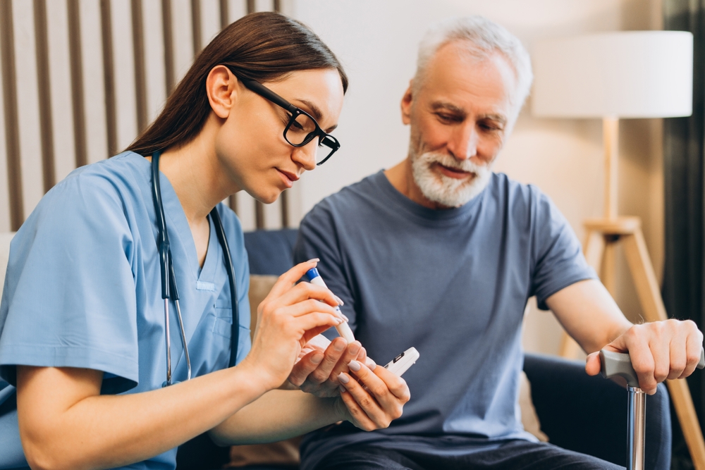 Healthcare provider assisting older male patient with GLP-1 microdosing to support diabetes and metabolic health management.
