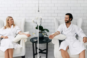 Man and woman receiving IV therapy for skin hydration at BODYWELLE.
