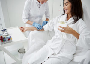 Patient receiving IV stem cell therapy in clinic setting to support anti-aging, cellular repair, and inflammation reduction