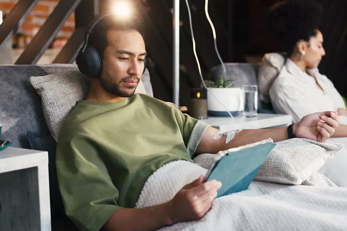 Patient relaxing during an IV-based wellness treatment.