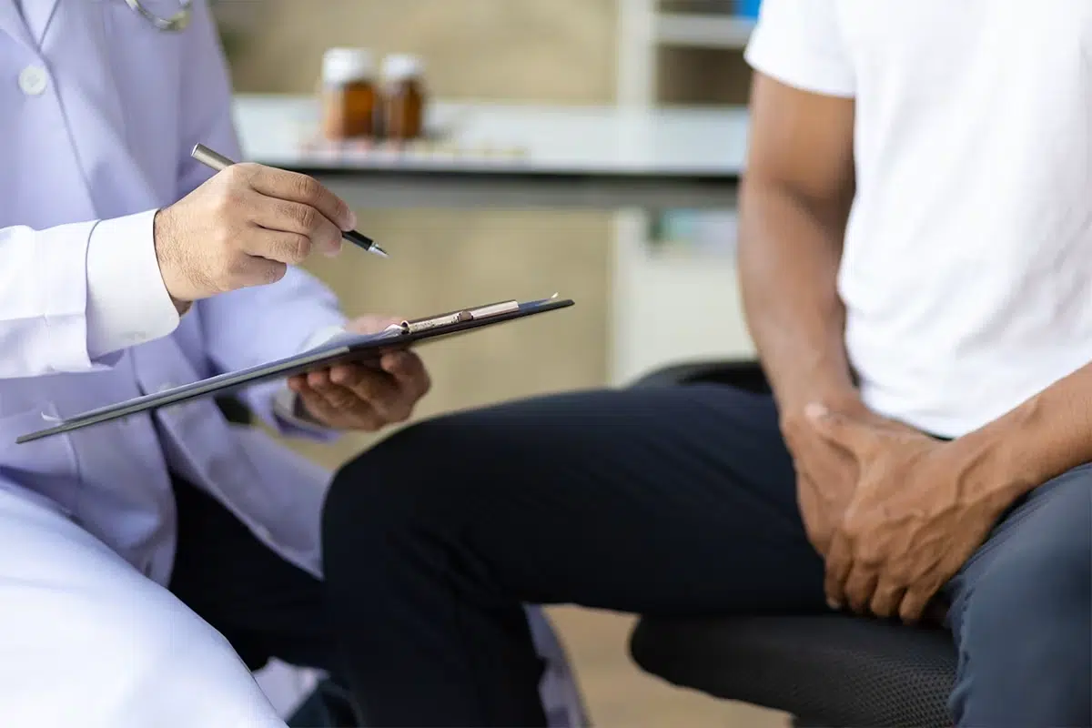 Male patient discussing erectile dysfunction with a medical provider.