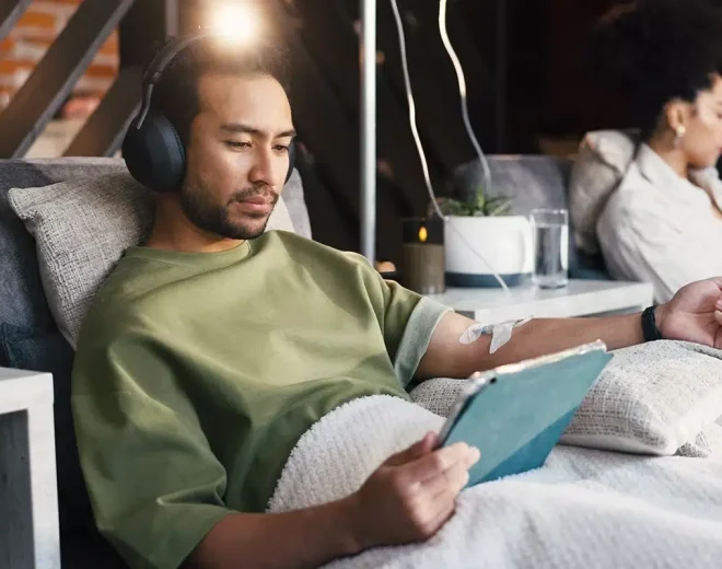Patient relaxing during an IV-based wellness treatment.