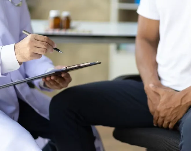 Male patient discussing erectile dysfunction with a medical provider.
